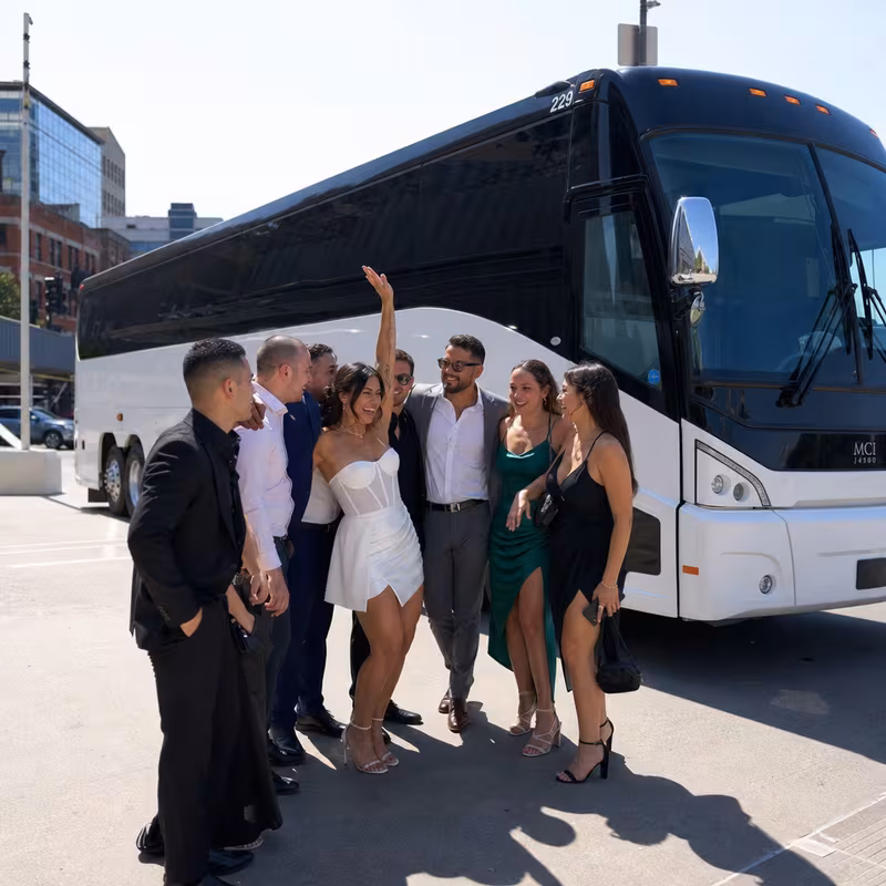 Passengers loading luggage while boarding an Staten Island group shuttle