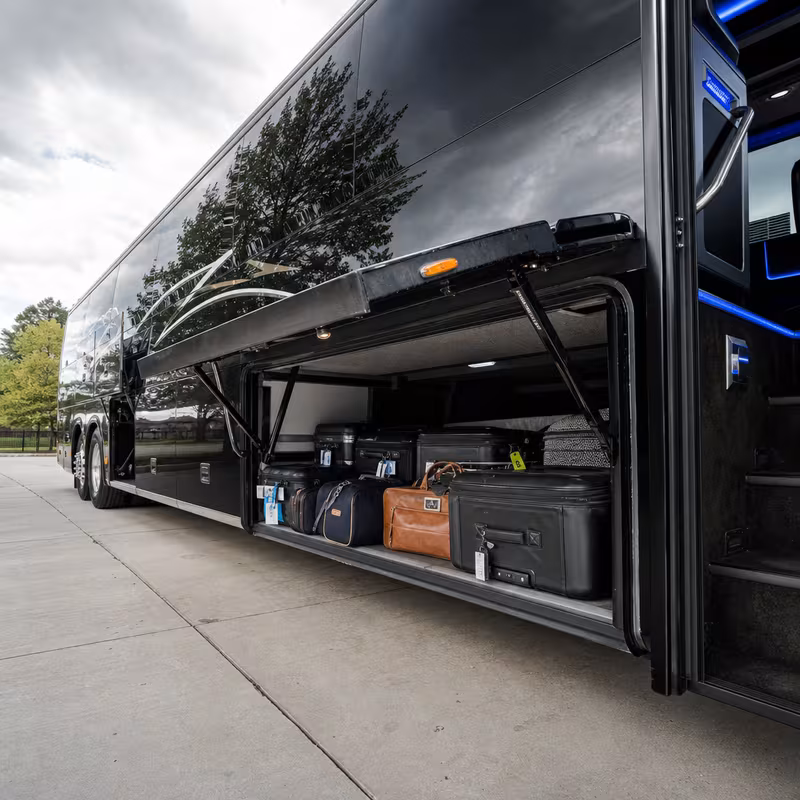 Party bus interior with wraparound leather seating and LED lighting in Staten Island
