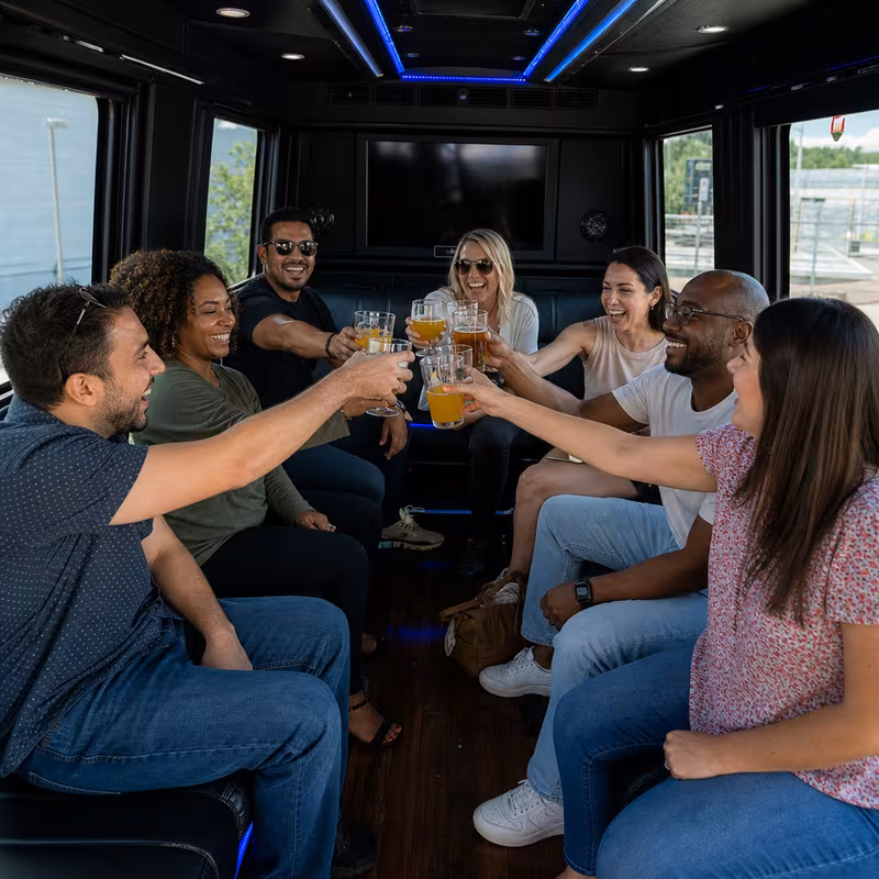 Group boarding a white charter bus for Winery & Brewery Tour Transportation transportation in Staten Island
